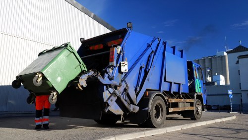 Professional skip hire trucks in Hackney streets