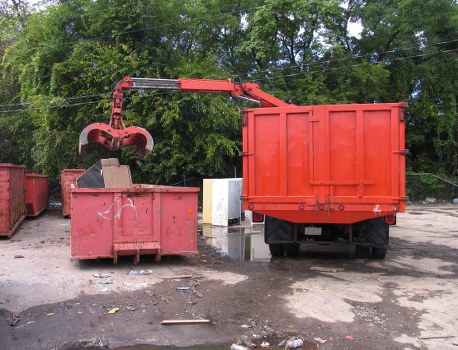 Empty skip ready for delivery in a Hackney location