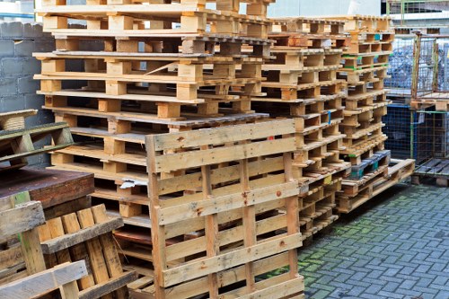 Team inspecting a skip and preparing for safe loading